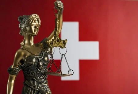 Lady justice and Swiss flag